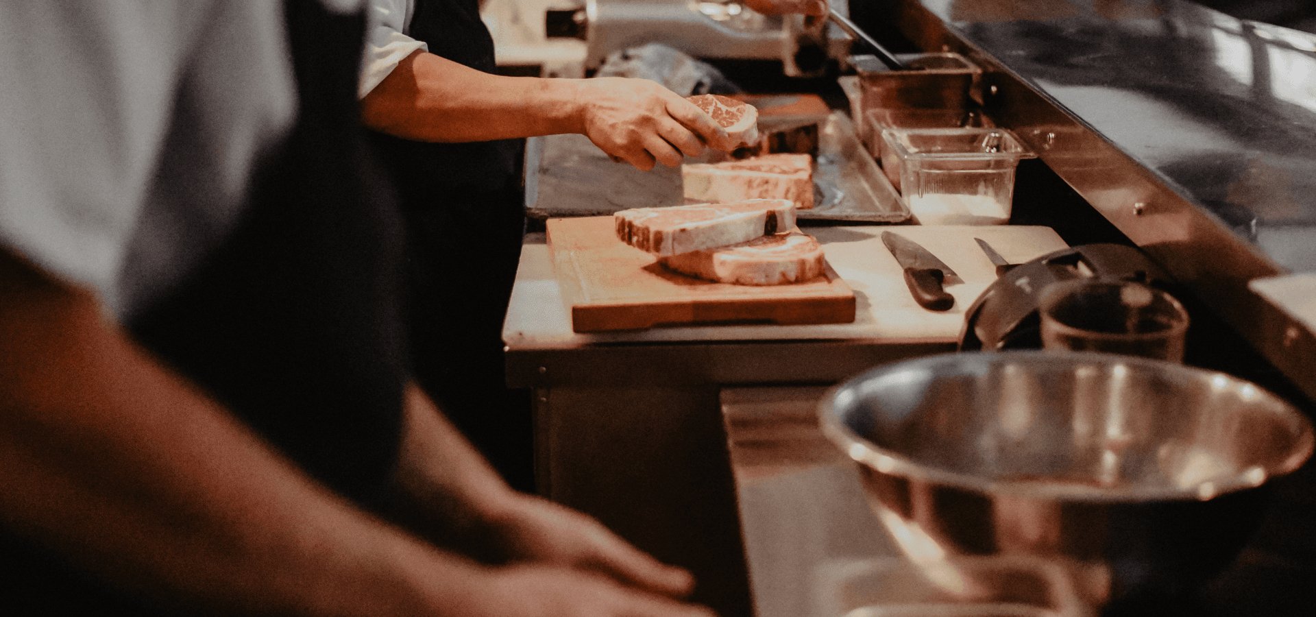 Close up of a kitchen line, preparing cuts of steak. Photo courtesy of BHC. Close up of a kitchen line, preparing cuts of steak. Photo courtesy of BHC.