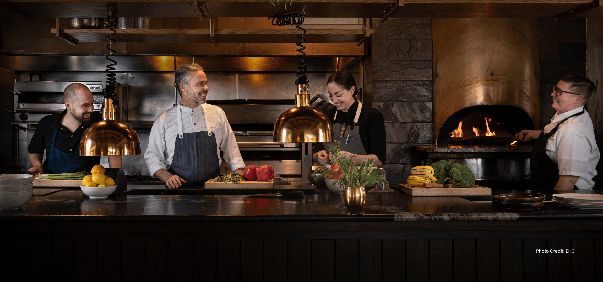 Chef and kitchen team at work. Photo courtesy of BHC. Chef and kitchen team at work. Photo courtesy of BHC.