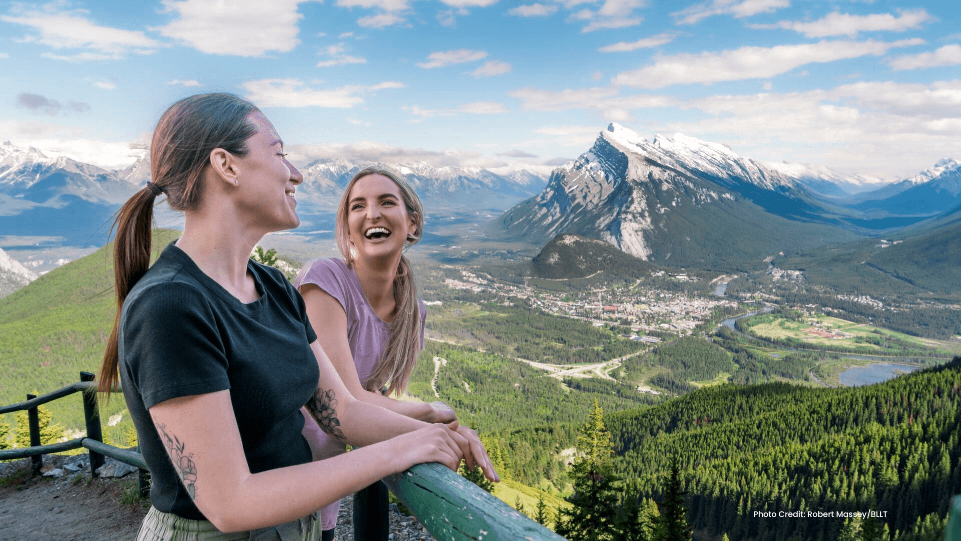 Two women looking out at the Town of Banff from Mt Norquay. Photo courtesy of BLLT. Two women looking out at the Town of Banff from Mt Norquay. Photo courtesy of BLLT.